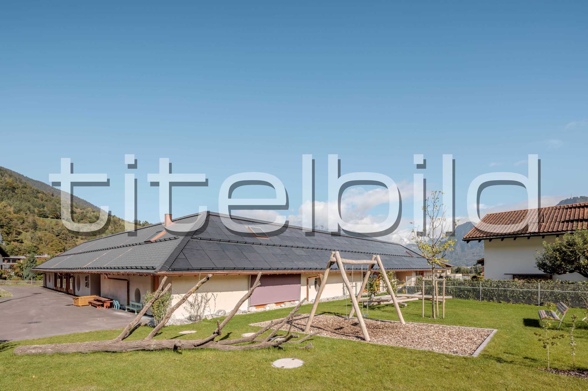 Projektbild-Nr. 1: Neubau Kindergarten mit Einstellhalle und Sportplatz